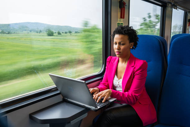 istock Business woman traveling with train 1250521103