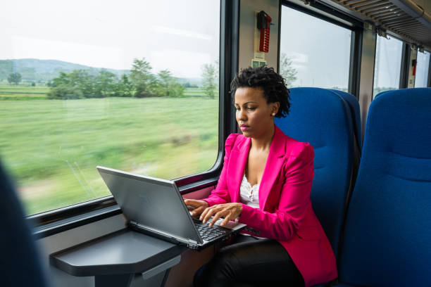 istock Business woman traveling with train 1250521111