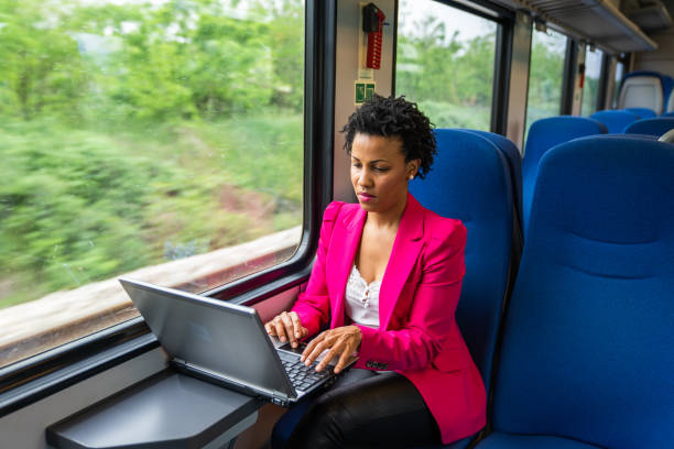 istock Business woman traveling with train 1250521129