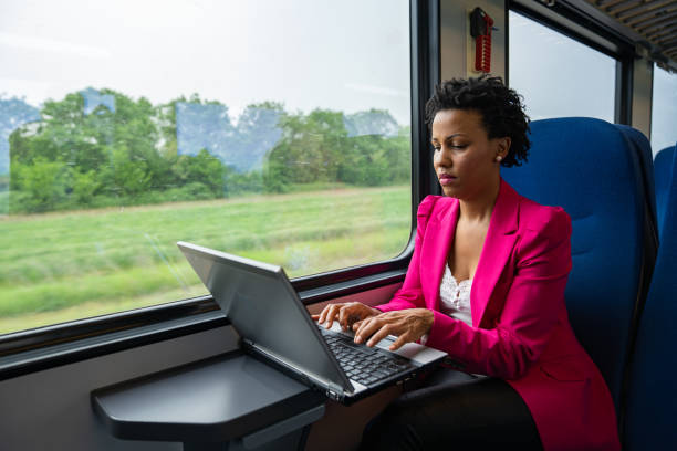 istock Business woman traveling with train 1250521194