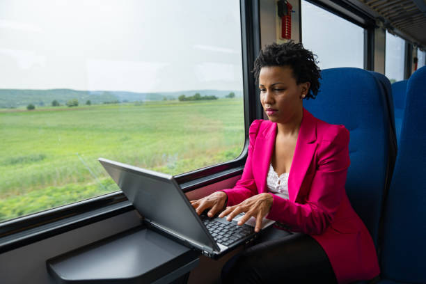 istock Business woman traveling with train 1250521208
