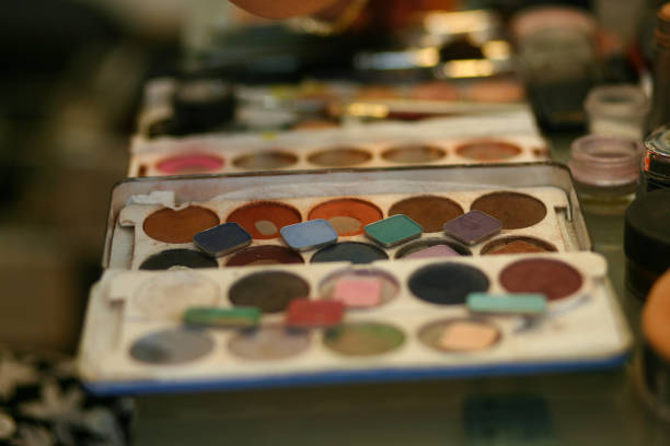 istock Colorful and Messy Palette for Make-up Eye Shadows 1250523510