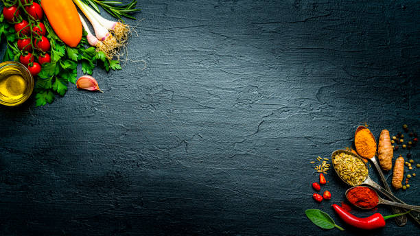 istock Spices and herbs in old spoons shot on white background. Copy space 1250524998