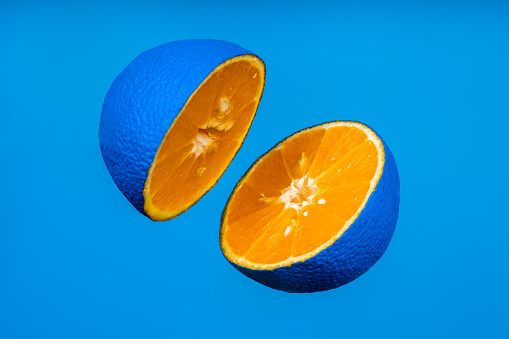 Blue orange fruit  on blue background