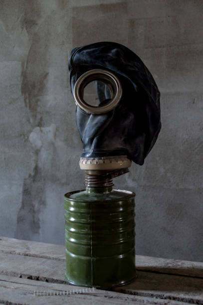 istock Gas mask against the gray wall. 1250527388