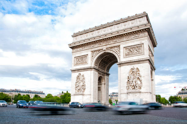 Arc de Triumph Place Charles de Gaulle Paris France.  Up to Champs Elysees, site of French Unknown soldier. Honors those who fought in Revolutionary Napoleonic and other wars.