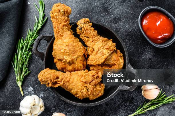 Spicy Deep Fried Breaded Chicken Drumsticks Black Background Top View Stock Photo - Download Image Now