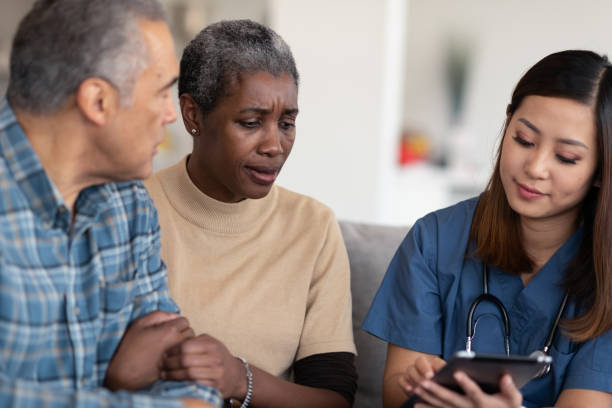 istock Nurse visits elderly couple in their home 1250551022
