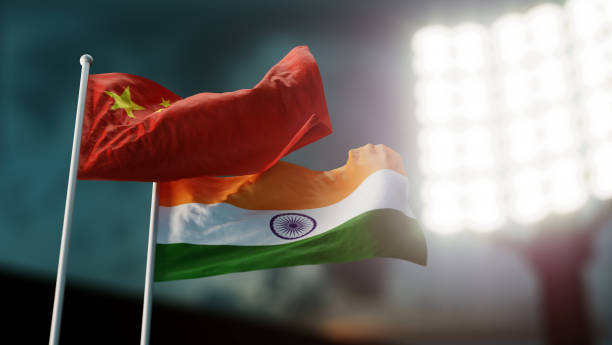 China and India flags waving on wind. 3d illustration stock photo
