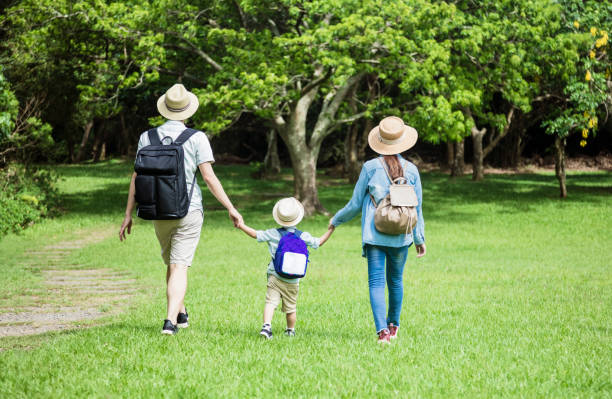 istock happy family hiking through the forest 1250553687