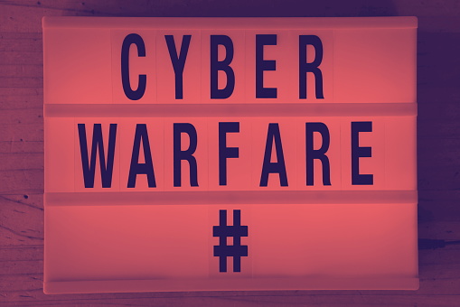 Words 'WCYBER WARFARE HASHTAG' in a Light Box Trend for a Cyber Modern Day Warfare Theme. That time when... Images for Social History.