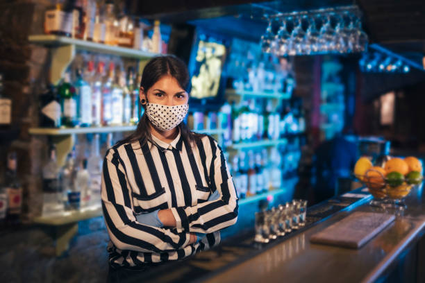 istock Portrait Of Woman Bartender With Protective Mask. 1250558393
