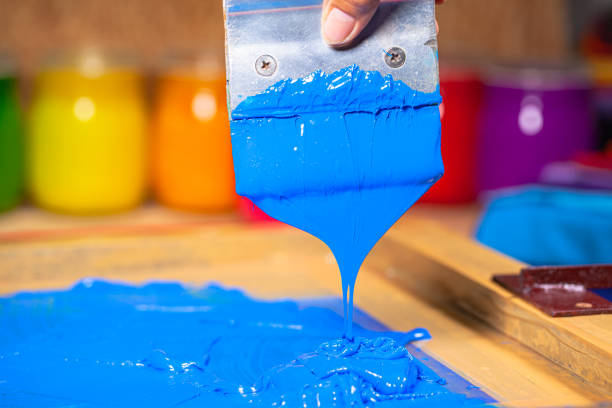 istock blue color dripping from hand screen printing 1250561453