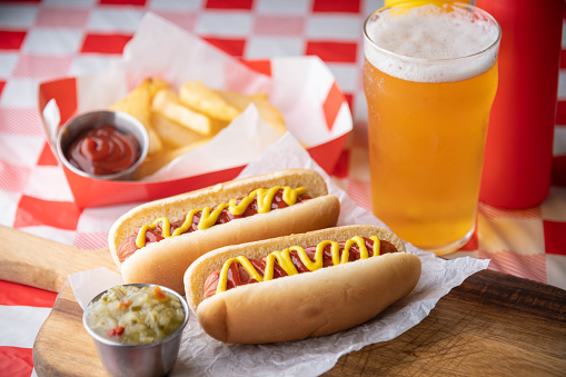 hot dog with beer and french fries