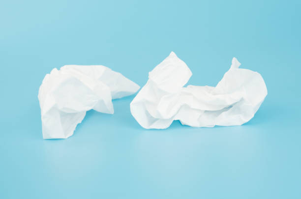 istock Tissue white paper crumpled isolated on blue background wipe object design 1250566478