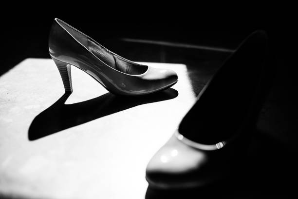 istock Bride's shoes. Game of light and shadow. 1250566537