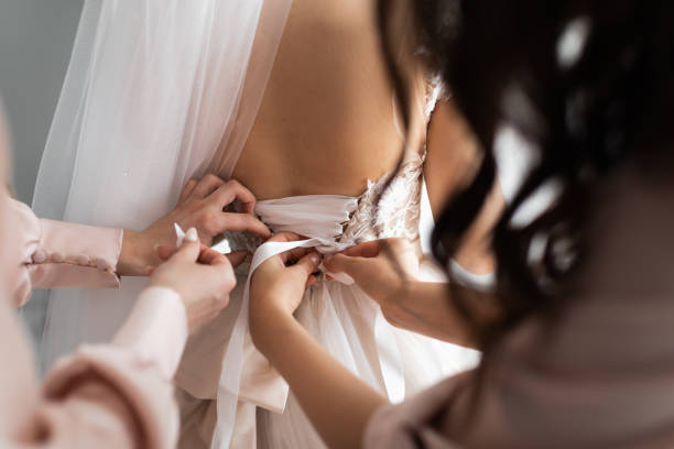 istock Couple. You can see the hands touching each other. 1250567072