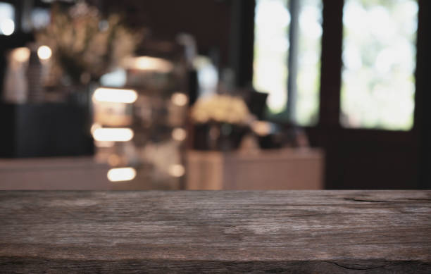 istock Wood Table Top in Blur Background room interior with empty copy space. 1250570505