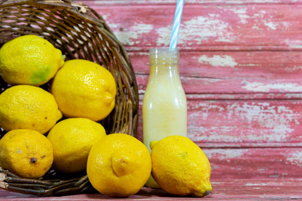 Fruits and lemon juice. Lemon from Central Asia. Source of vitamin C. Acidic fruit for juices. Refreshing drink. Italian lemon.
