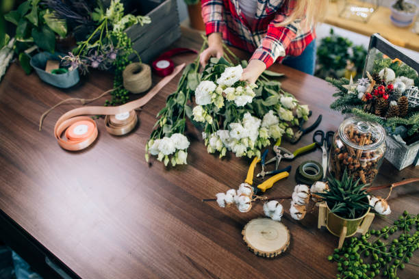 istock top view on cropped florist with flowers 1250582613