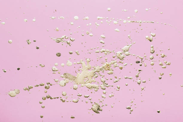 istock Pink cardboard with gold potal drops and splashes. Creative background 1250584598