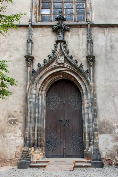 istock Old door in a medieval building 1250585366