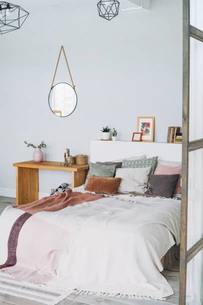 istock Scandinavian modern cozy bright interior in bedroom 1250586491