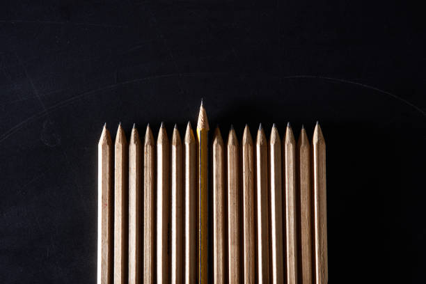 Large group of pencils in a circle with tips together