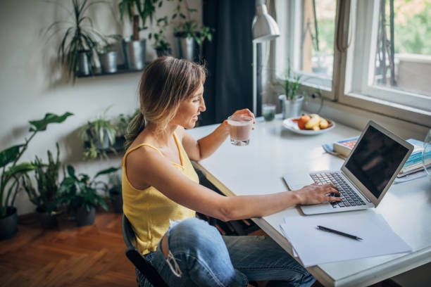 istock Beautiful woman studying for exam at home 1250593439