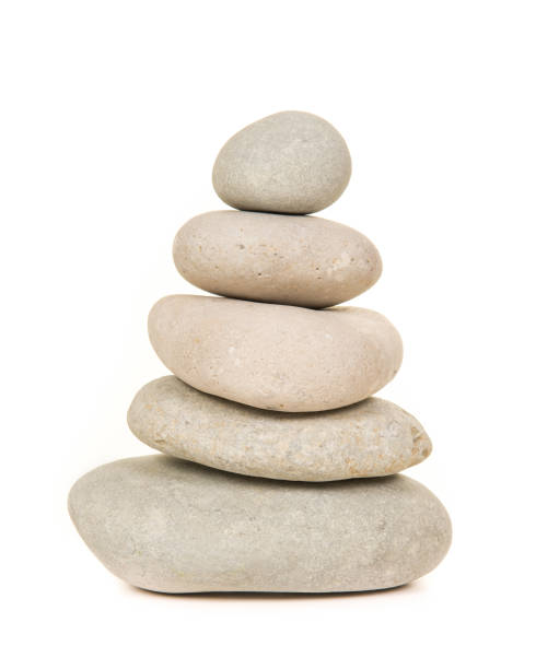 istock Pile of grey stones on a white background 1250594035