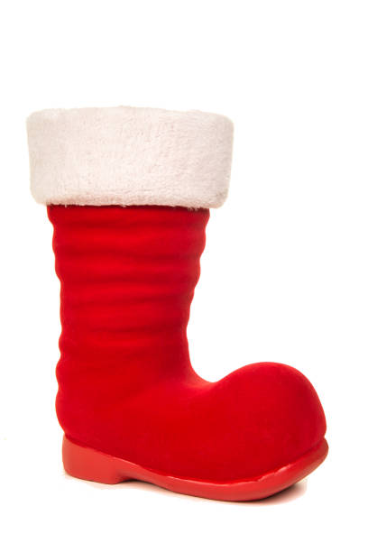 istock Red and white santa's boot isolated on a white background seen from the side 1250595121