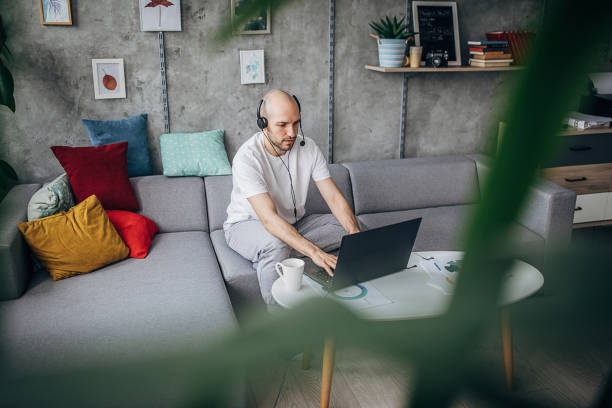 istock Man working on laptop at home 1250595937