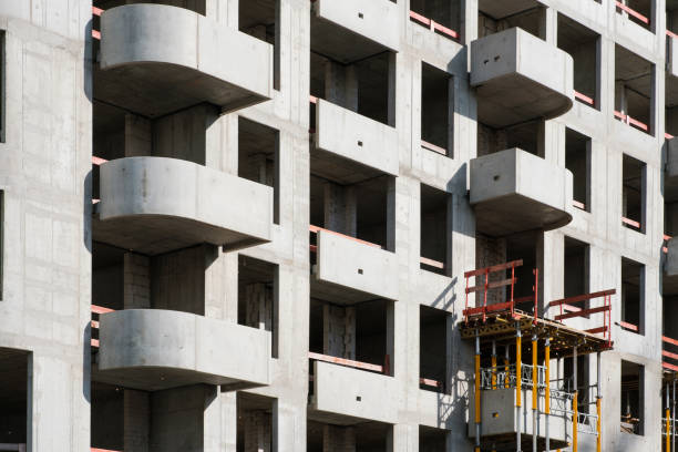 istock building shell of apartment building under construction - real estate 1250596743