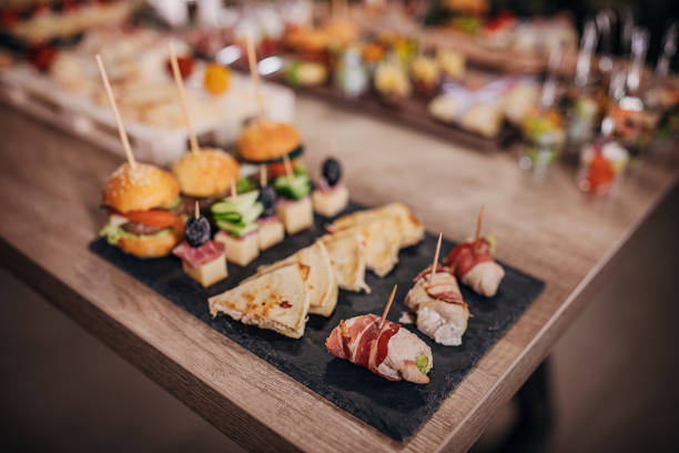 istock Beautifully arranged canapes appetizers on table 1250598431