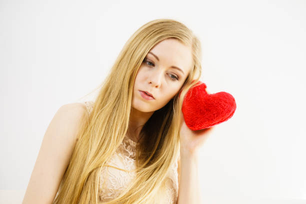istock Sad woman on Valentines day 1250598470