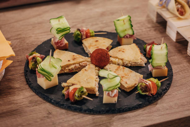 istock Beautifully arranged canapes appetizers on table 1250598762