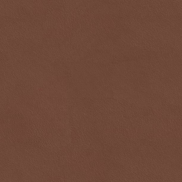 istock Elegant brown leather texture. Seamless square background, tile ready. 1250599503