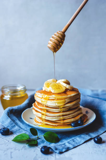 istock Stack of pancakes with fresh banana. 1250602002