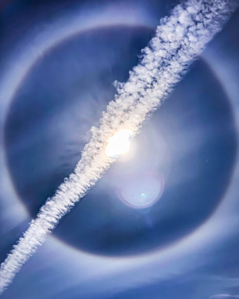 istock The Ring, the Sun, Vapor Trails & Blue Sky 1250602616