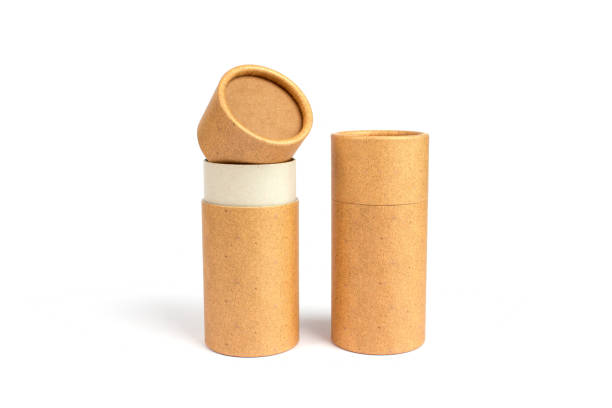 istock Open and closed paper tubes with paper end caps, cardboard containers for packaging isolated on white background with copyspace, mockup 1250603527