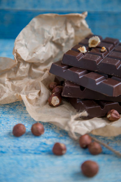 istock A piece of chocolate with hazelnuts and nuts 1250608916