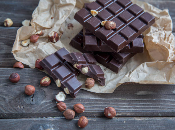 istock A piece of chocolate with hazelnuts and nuts 1250608997