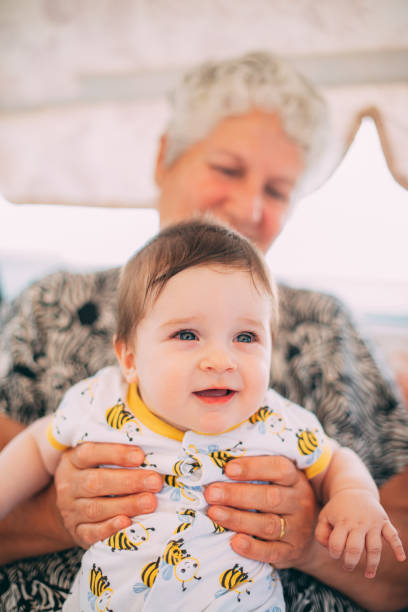 istock Baby Boy Spending Time With His Grandmother 1250611888