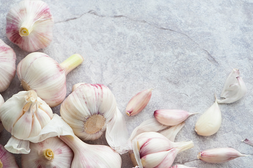 composition of garlic and spices isolated on white background