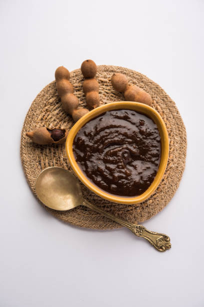 Tangy Tamarind Puree Or Imli Paste Tamarind Or Imli Fresh Puree, Paste from Pulp chutney stock pictures, royalty-free photos & images