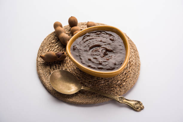 Tangy Tamarind Puree Or Imli Paste Tamarind Or Imli Fresh Puree, Paste from Pulp tangy stock pictures, royalty-free photos & images