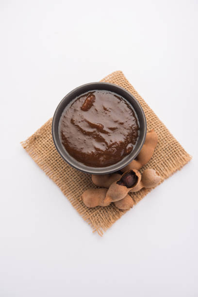 Tangy Tamarind Puree Or Imli Paste Tamarind Or Imli Fresh Puree, Paste from Pulp tangy stock pictures, royalty-free photos & images