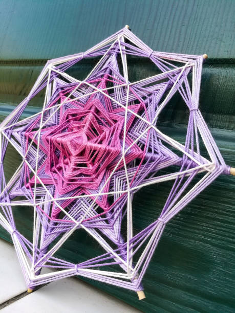 istock Woven bright God's eye mandala home talisman 1250620965