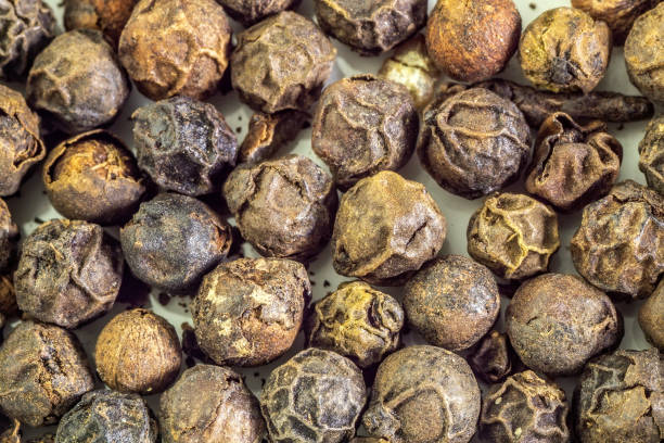 istock Black pepper Macro full depth of field. background texture 1250620968