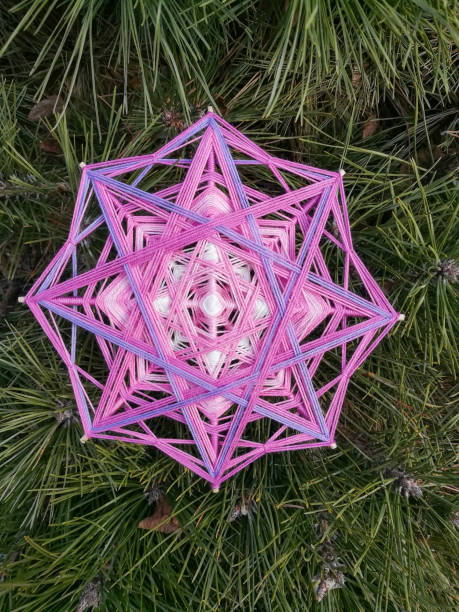 istock Woven bright God's eye mandala home talisman 1250621005